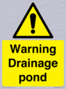 warning-drainage-pond~